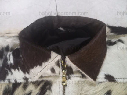 Genuine cow hide jacket with a spotted hair-on-hide finish. Built for men and women who prefer real western wear with bold texture and everyday comfort.

