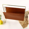 Nordic leather and iron sling magazine rack