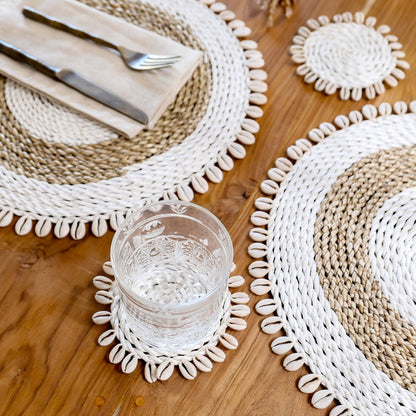 Natural seagrass placemats with cowrie shells