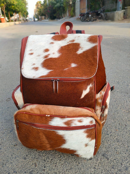 Speckled brown white cowhide travel backpack