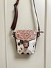 Cowhide crossbody bag with tooled leather