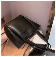 Versatile genuine black leather tote bag