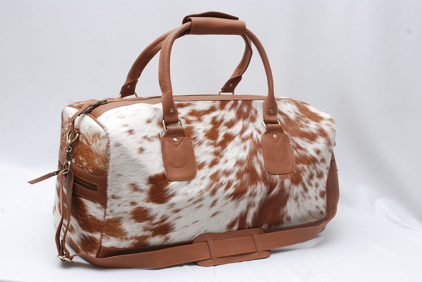 Brown White Cow Skin Overnight Duffle Bag