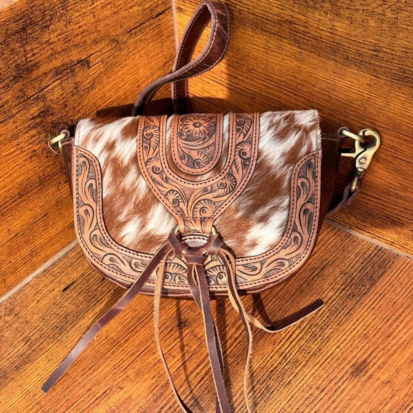 Cowhide crossbody bag tooled leather