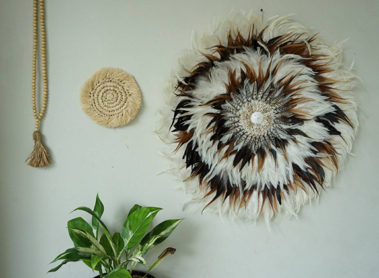 White mixed brown juju hat sea shell wall hanging