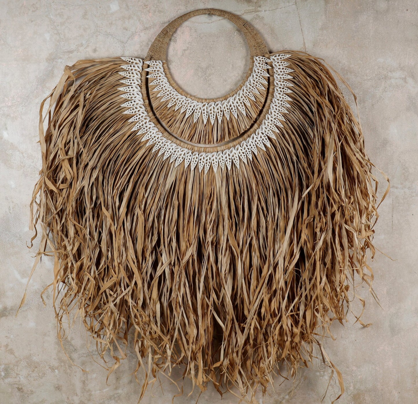 The papua natural raffia and shells wall hanging decor