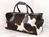 Travel in style with our cow skin overnight bag. Sleek, sturdy, and designed to accompany you on your adventures.