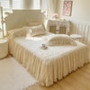 Quilted Bedspread with Lace Ruffled Bed Skirt and Floral Embroidery