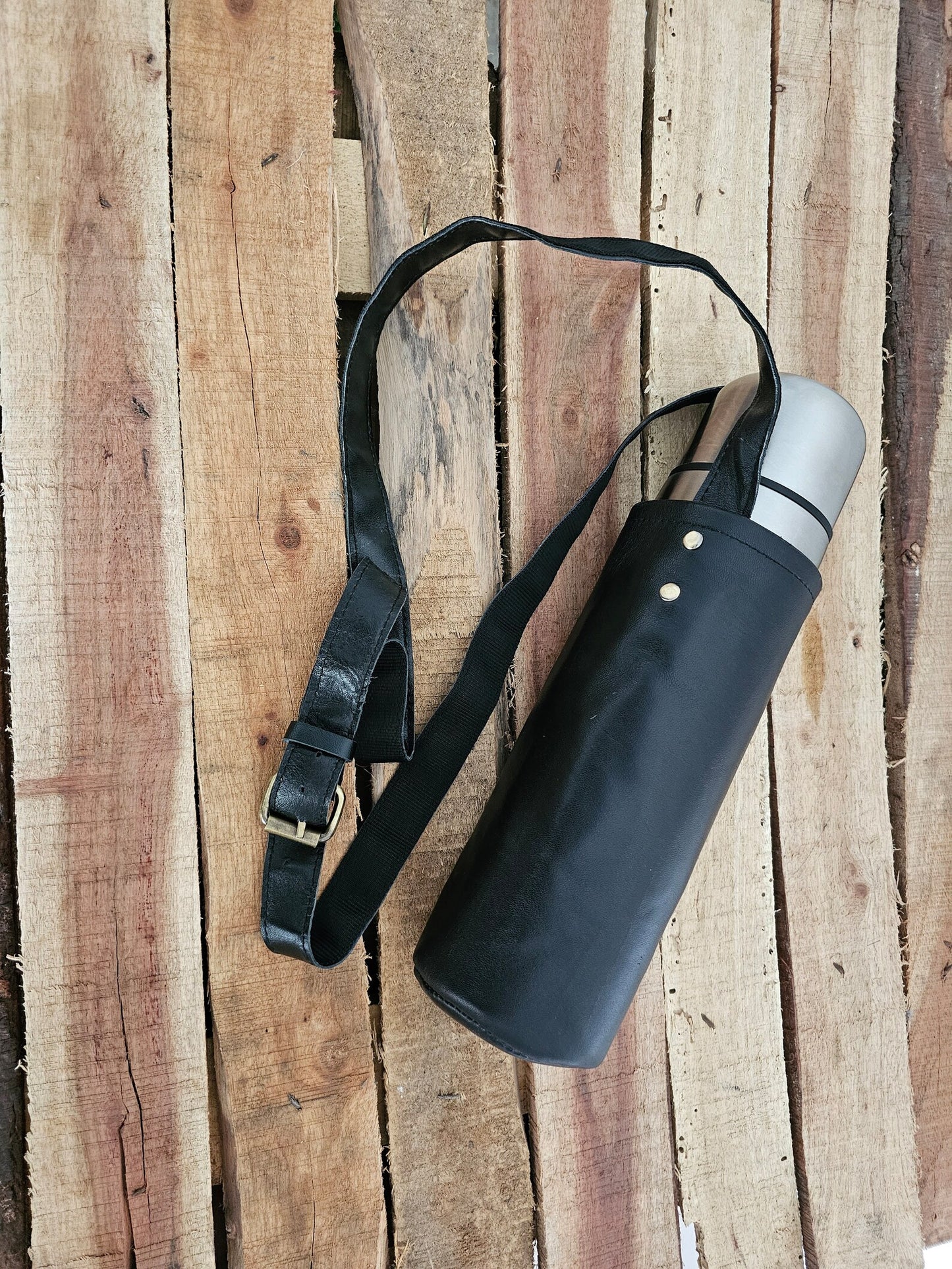 Reusable leather water bottle carrier