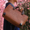 Woven Straw Rattan Handbag with Wooden Handles and Leather Corners