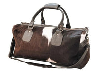 Stay active and organized with our cowhide gym bag. Durable, practical, and ready for your everyday workouts.