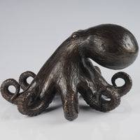 The bronze octopus hand casted brass marine art statue.