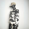 Premium cowhide leather jacket featuring natural black white hide. Rodeo-ready winter coat for men and women, designed for ranch and country lifestyle.