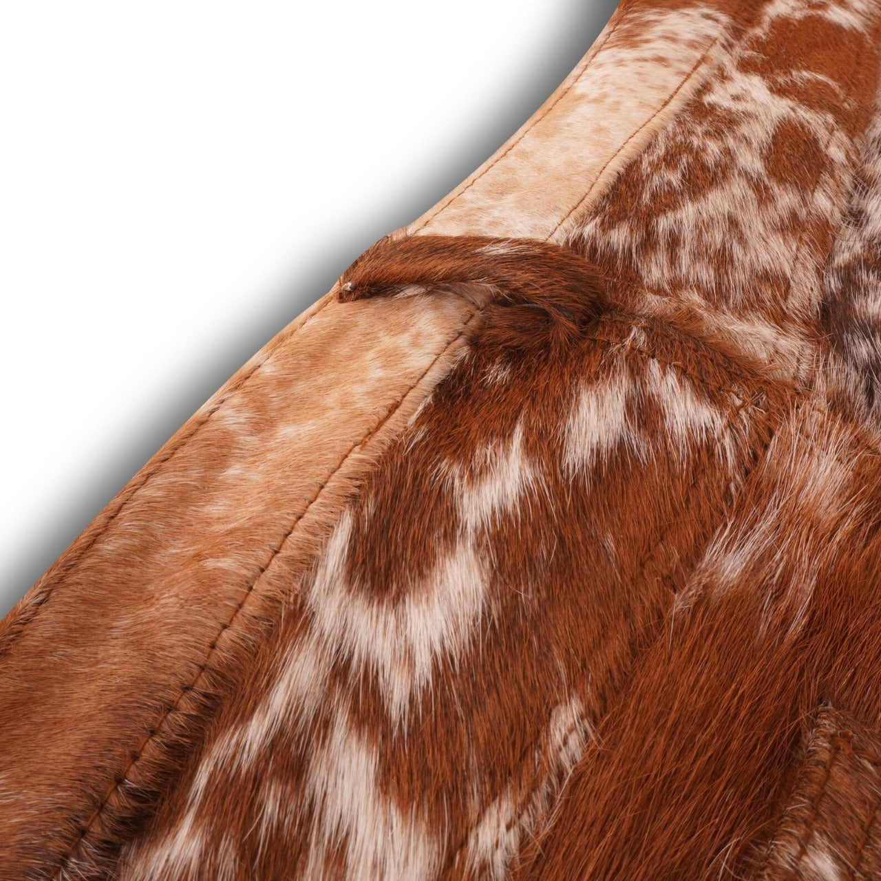 Upgrade your western wardrobe with these plus size cowhide shorts, crafted from real brown and white hair-on hide. Designed for curvy fits, these cowhide shorts deliver comfort, bold patterning, and cowboy-approved style.