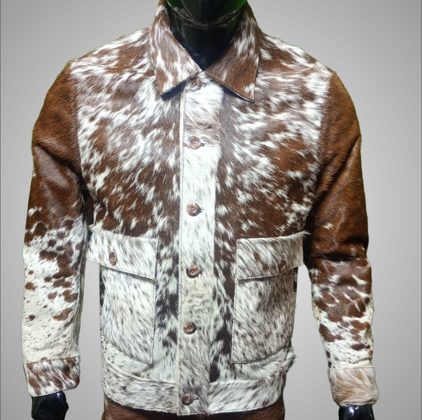 Cowhide leather jacket mens made from authentic tricolor cow fur. Cow print skin jacket designed for rodeo fashion, southern outfits, and bold country styling.

