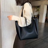 Versatile genuine black leather tote bag