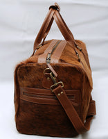 Cowhide weekender bag: rugged elegance, spacious and durable for getaways