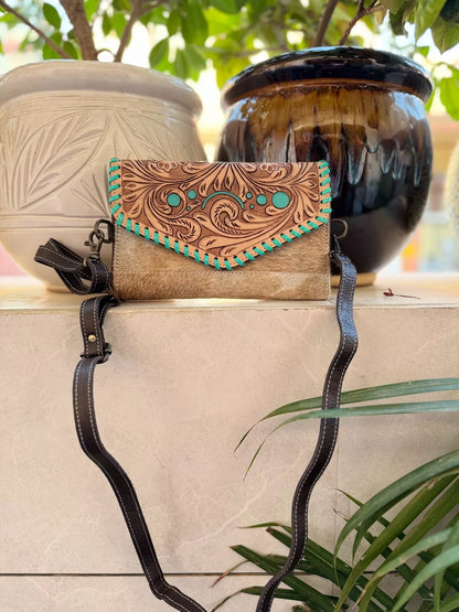 tooled leather hair on hide crossbody handbag