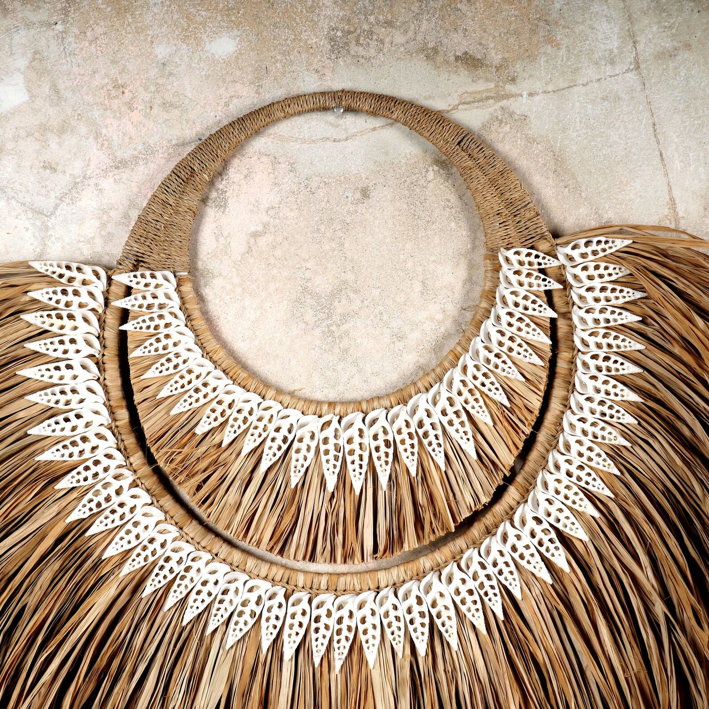 The papua natural raffia and shells wall hanging decor