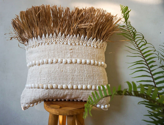 Natural raffia and white shells pillow cover