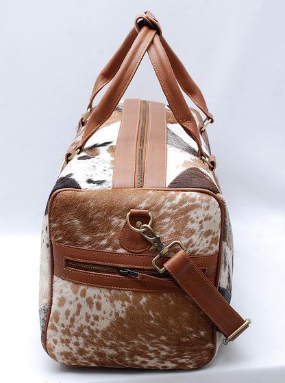 Travel in rugged elegance: cowhide weekender