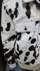 Black and white cowhide jacket for men crafted from real cow skin. Eye-catching fur pattern ideal for western jackets, country wear, or bold casual style.