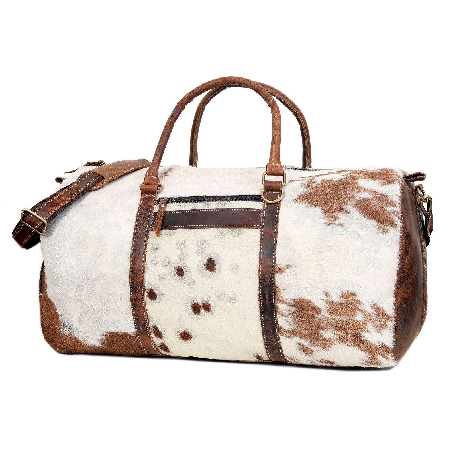 Embark on your next adventure with this cowhide overnight bag, a symbol of sophistication and practicality for the modern explorer.