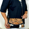 Hand tooled cowhide leather crossbody mini bag