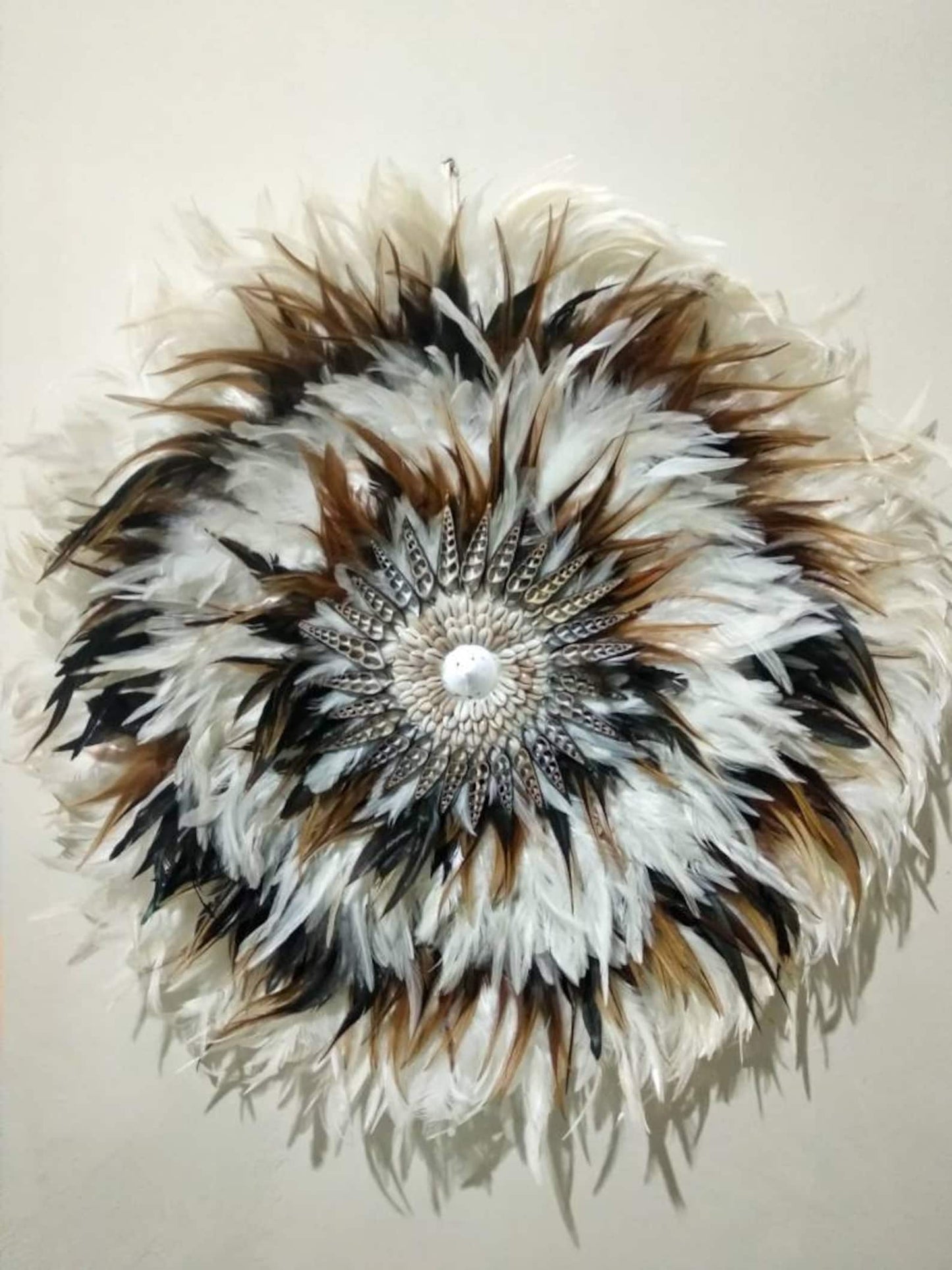 White mixed brown juju hat sea shell wall hanging