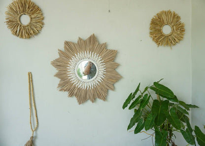 Sunburst shape raffia cowrie sea shells mirror