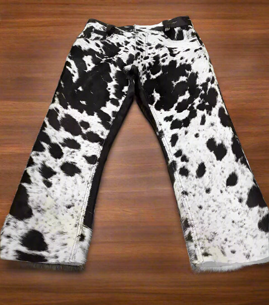 Black and white cowhide pants made from genuine hair-on hide. Perfect cowhide trousers for men and women in rodeo outfits, western weddings, and cowboy styling.