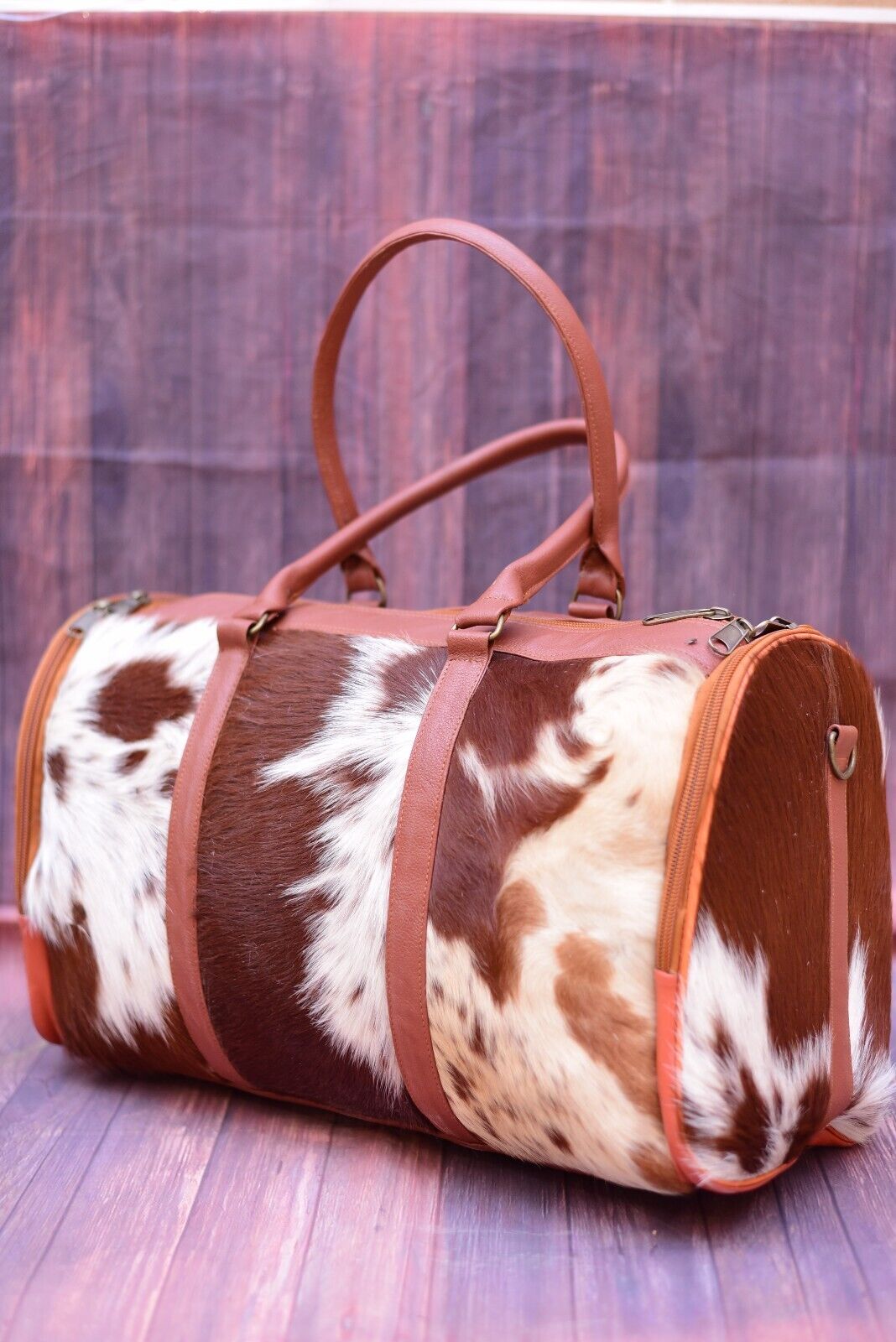 Classic cowhide duffle bag for your next adventure. Timeless style.