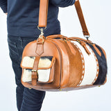 Step into adventure with this cowhide duffle bag, your companion for every journey.