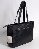 Chic Black and White Cowhide Tote Bag