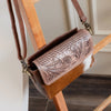Handmade Tooled Leather Crossbody Bag with Cowhide Fur