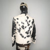 Unisex cowhide fur coat in black and white. Authentic western rodeo jacket, premium quality cow skin design for country living and winter fashion.