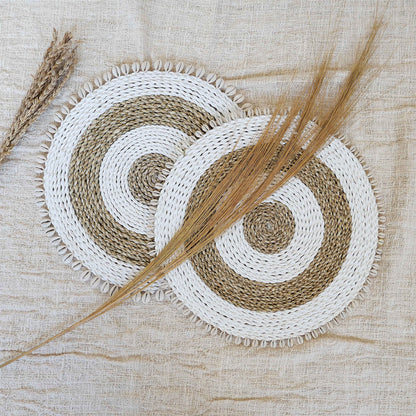 Natural seagrass placemats with cowrie shells