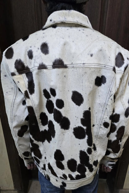 Men’s cowhide jacket with authentic cow print in natural fur. Unique cow fur coat blends cowboy edge with modern outerwear appeal.