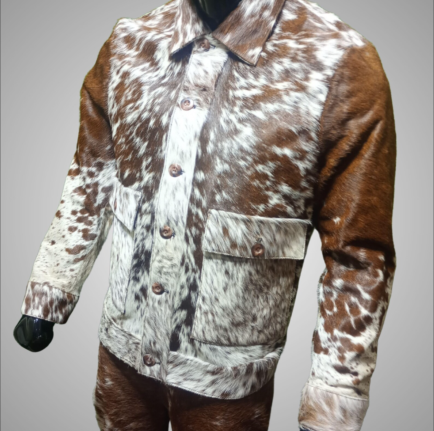 Men’s cowhide jacket made from real cow fur. This tricolor cow print skin jacket features bold texture, western design, and a rugged hide finish for standout outfits.

