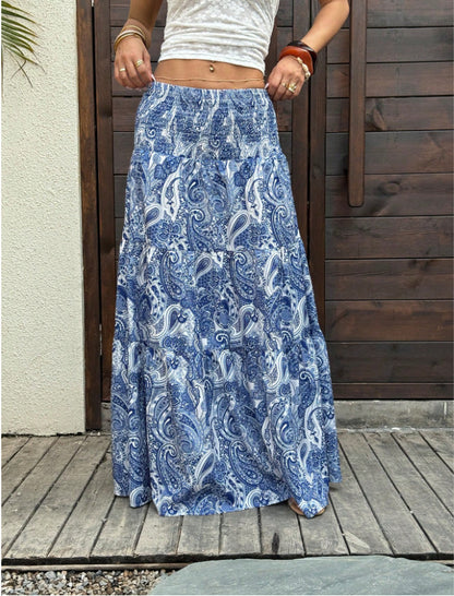 Smocked waist maxi skirt with tiered paisley print