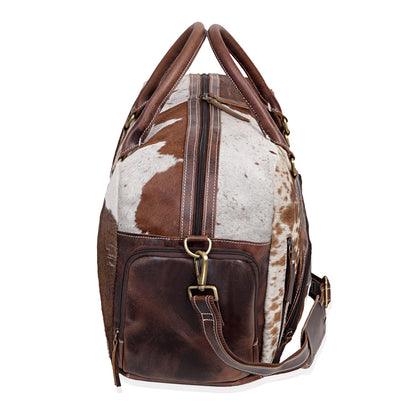Hit the gym in style with this cow skin gym bag, your perfect companion for fitness enthusiasts.