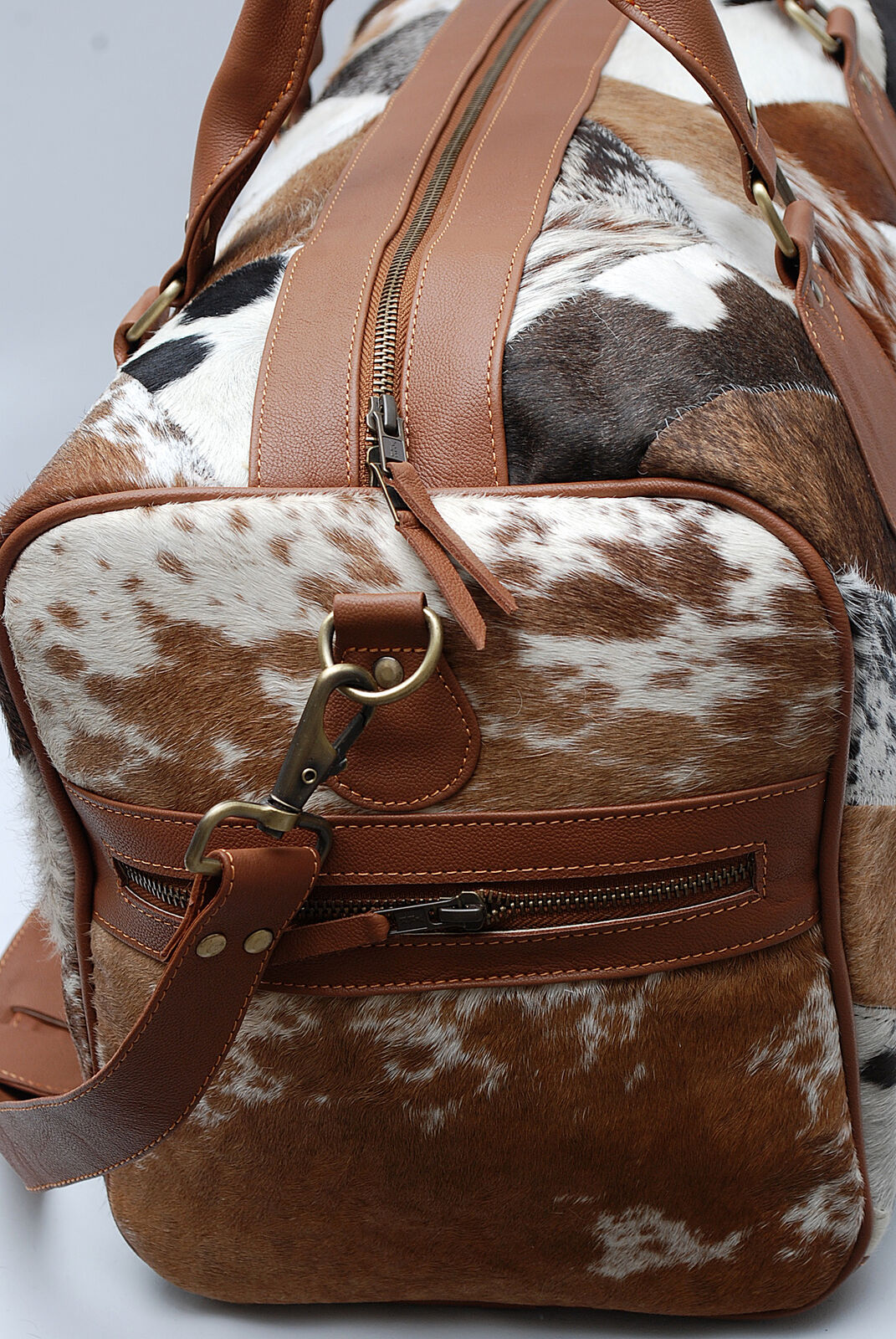 Travel with sophistication: cow skin travel bag