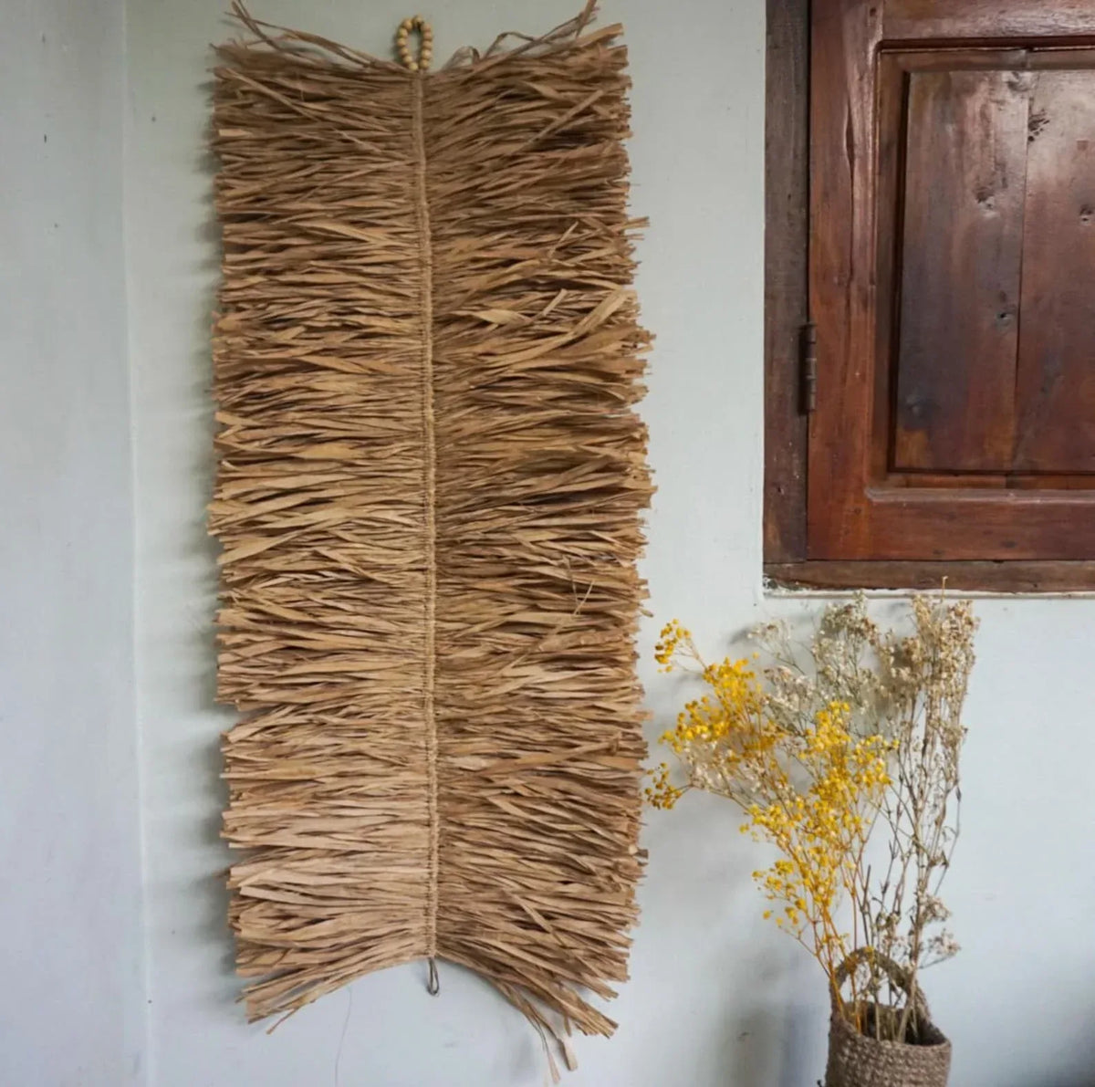 Image showcasing Bali Art seagrass natural wall hanging – Boho Living Room