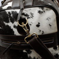Get ready to turn heads with a fashionable cowhide handbag by your side