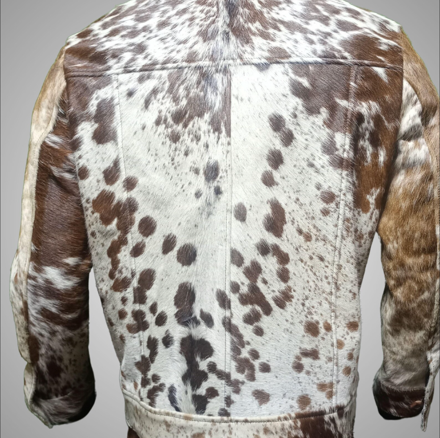Cowhide leather jacket mens made from authentic cowhide fur. Speckled tricolor hide jacket with real grain, perfect for rodeo outfits, ranch wear, or country styling.

