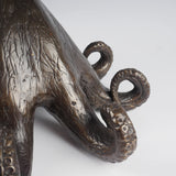 The bronze octopus hand casted brass marine art statue.