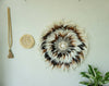 White mixed brown juju hat sea shell wall hanging