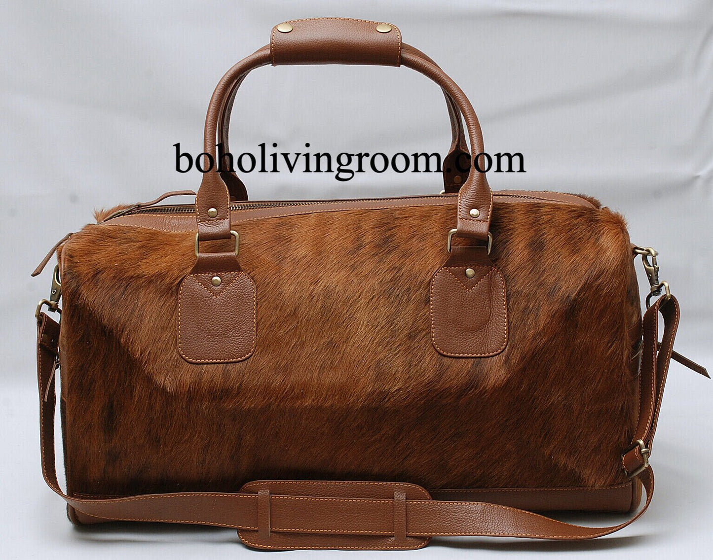 Cow skin travel bag: sleek design, spacious and reliable, perfect for adventures.
