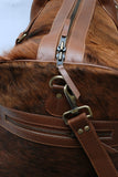 Cow skin overnight bag: chic and sturdy, perfect for overnight stays, timeless design.