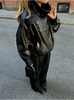 Oversized leather jacket women's casual style with functional pockets and relaxed dropped shoulders.